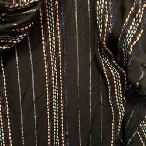 Woman’s black and metallic striped pull over dress never worn